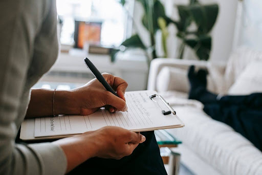 Person filling a form