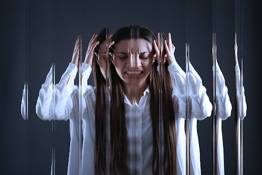 Paranoid woman fighting voices in her head