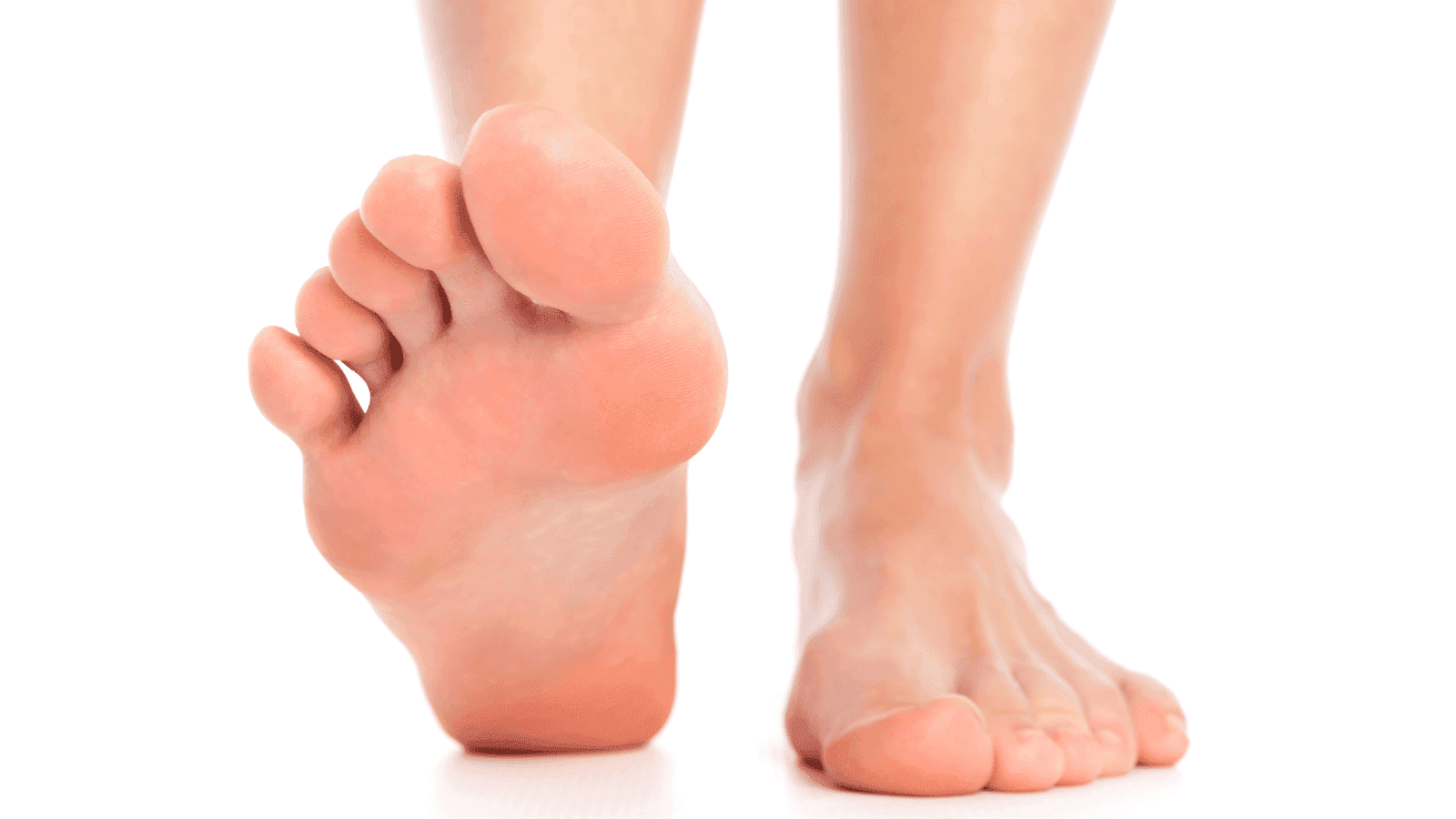 Close-up of clean, healthy feet walking on a white background