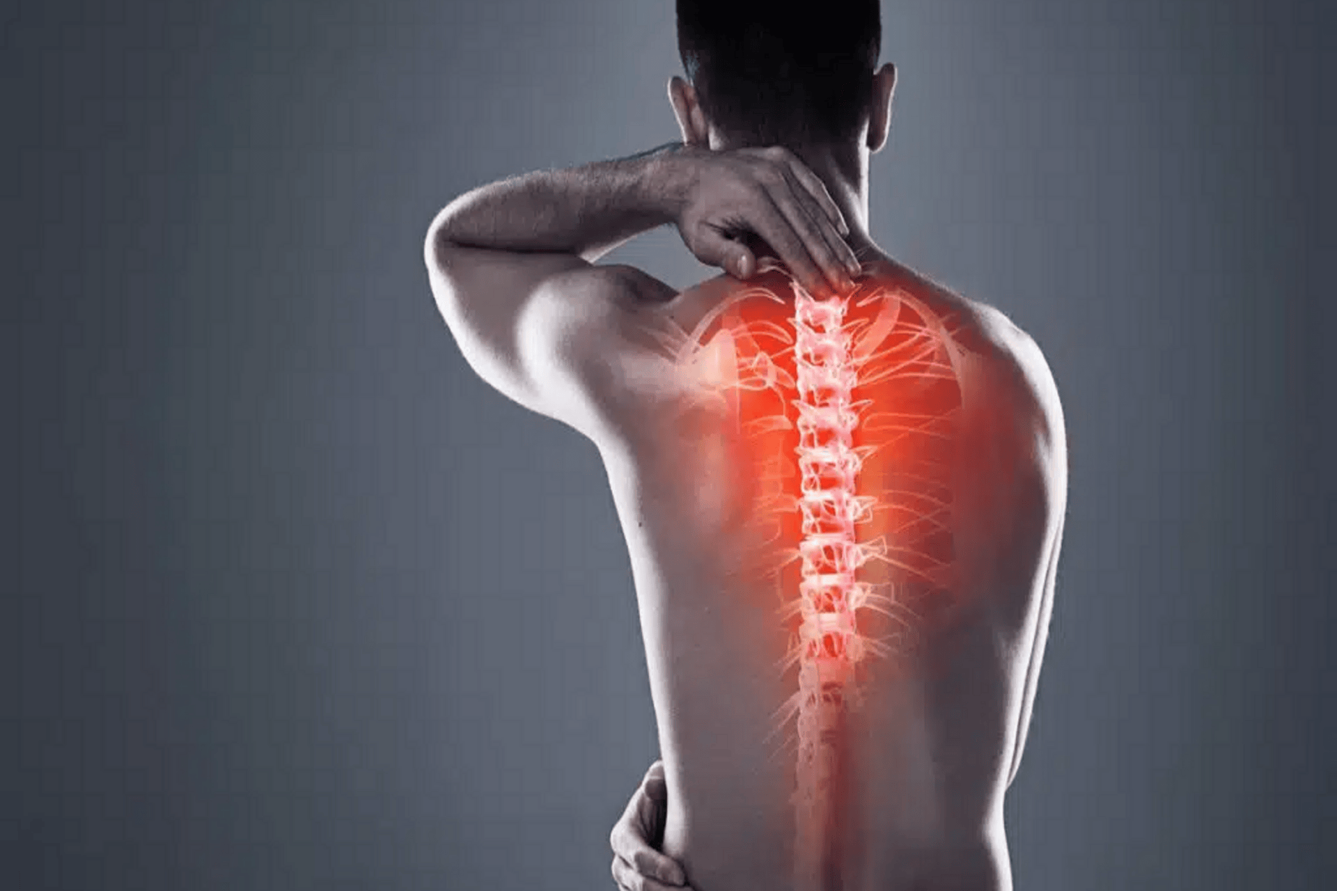 A man holds the back of his neck with one hand while a red-highlighted overlay shows pain along the cervical and upper spine.