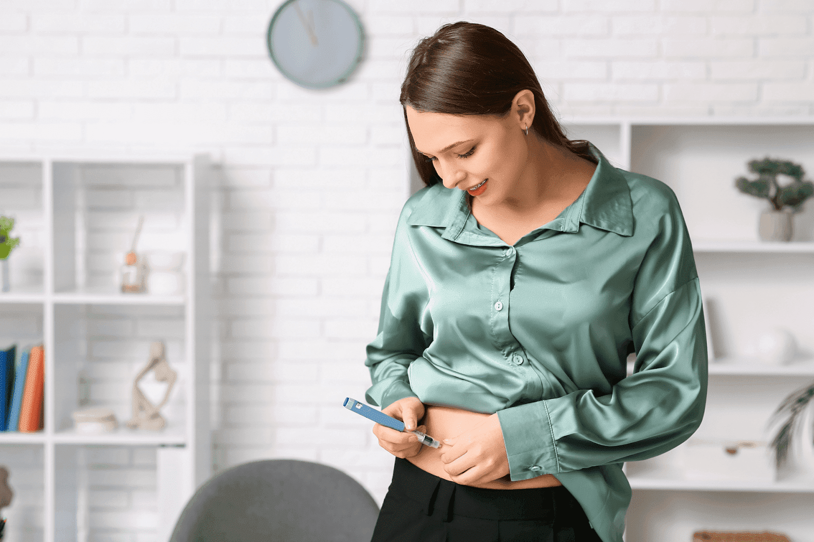 Diabetic Woman Giving Herself an Insulin Injection in the Office