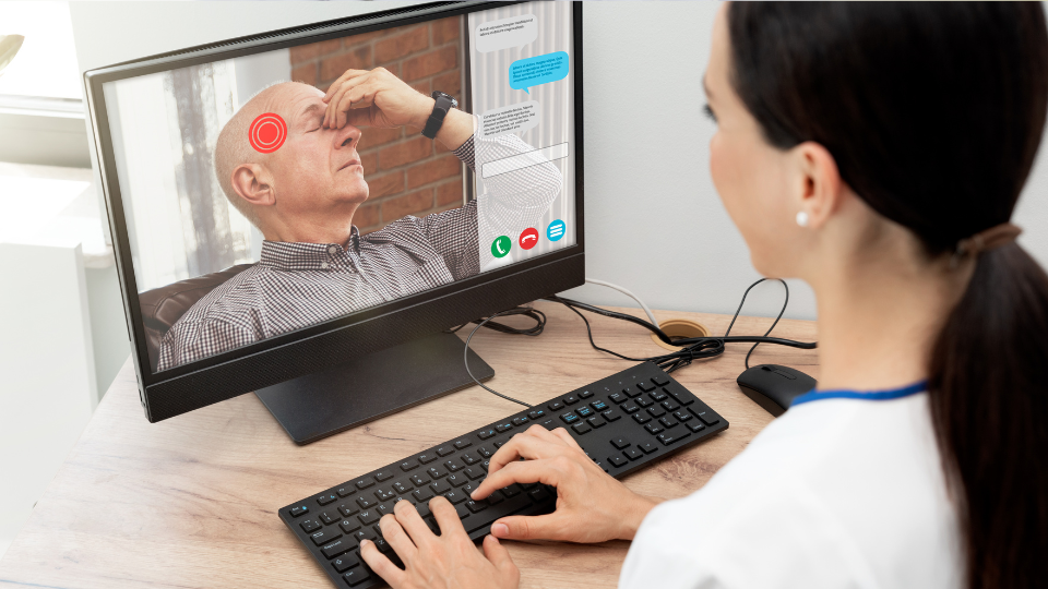 Doctor on telehealth video call checking patient for concussion