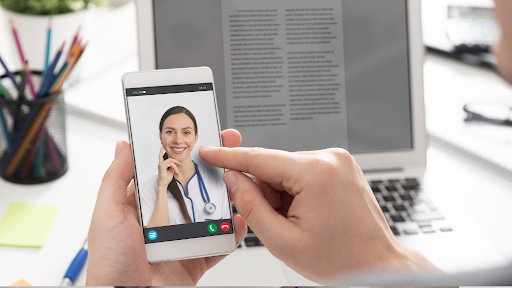 Person on video call with Doctor