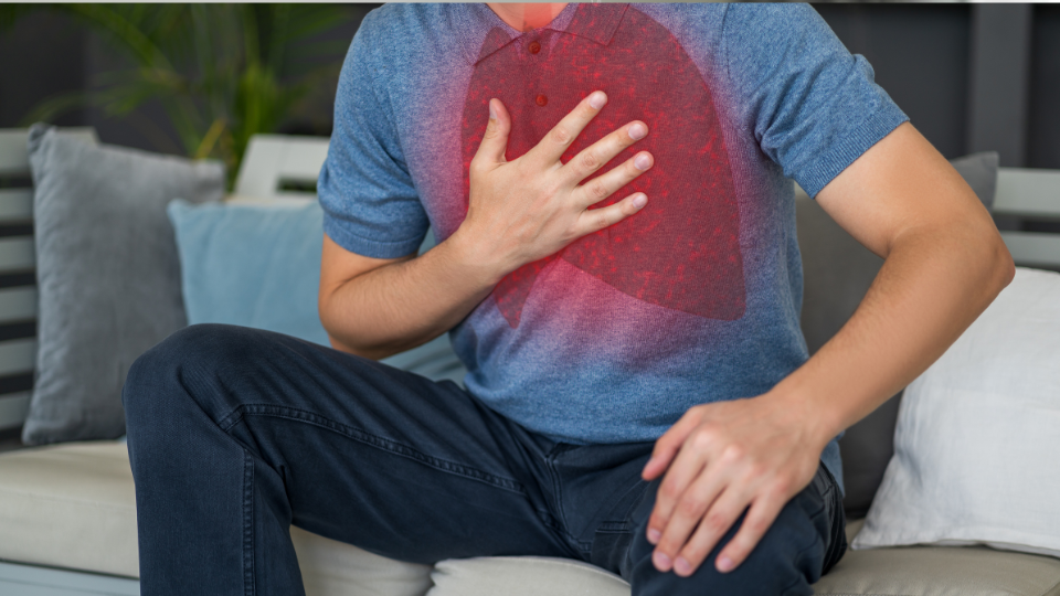 Man holding hand on chest with illustration of lungs