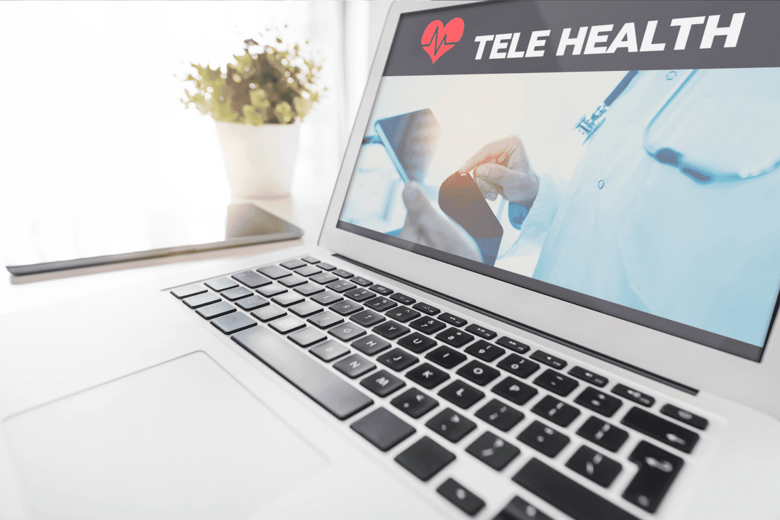 Laptop showing a telehealth service screen with a doctor image and text "Tele Health"