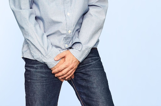 Man suffering from pain in the groin area