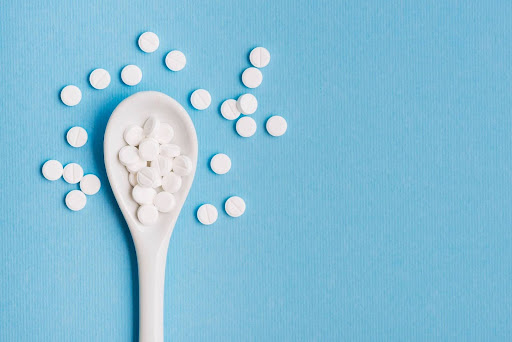 Pills on a spoon