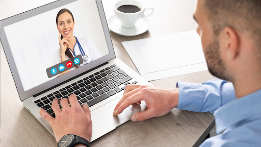 Man on telehealth video call with doctor