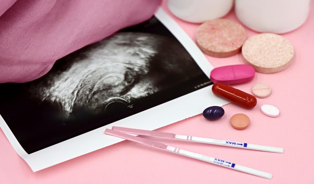 Ultrasound image surrounded by medical tablets