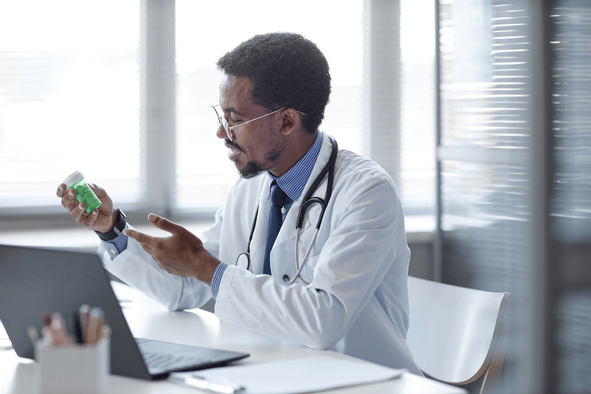 Doctor explaining medication details during an online consultation.