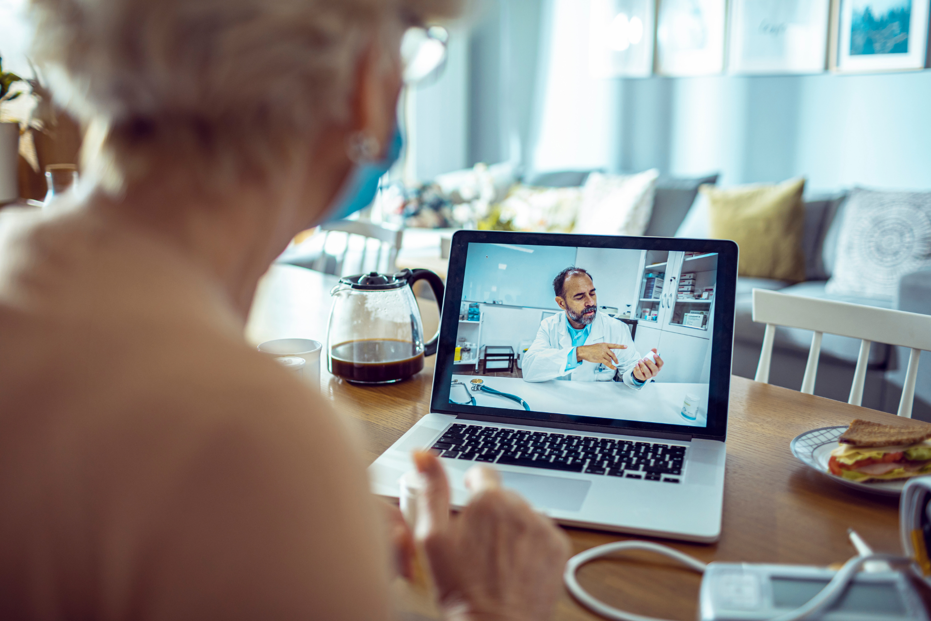 Older woman having an online consultation with a doctor on her laptop.”