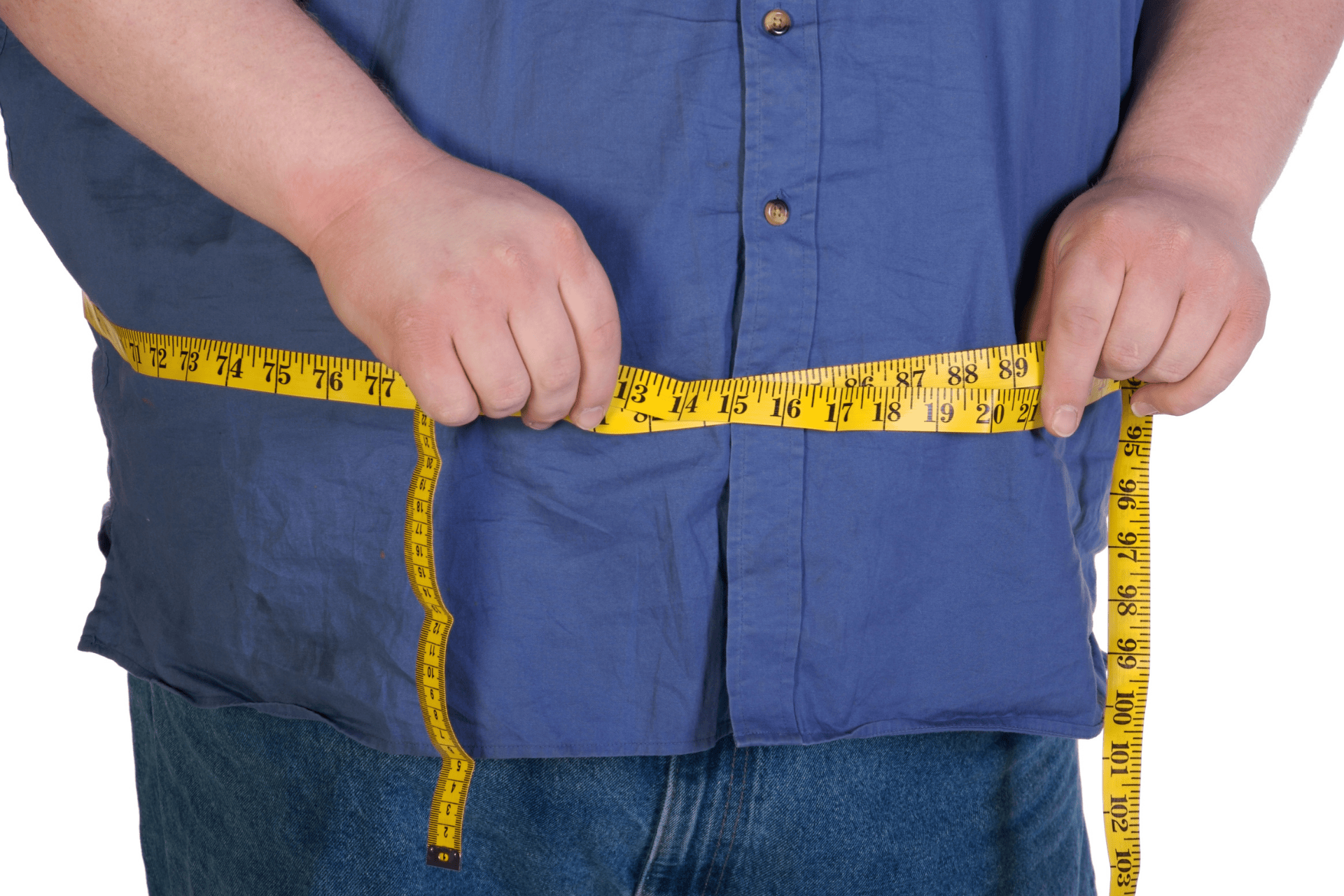 Person measuring waist circumference with a tape measure, symbolizing weight management and health assessment.