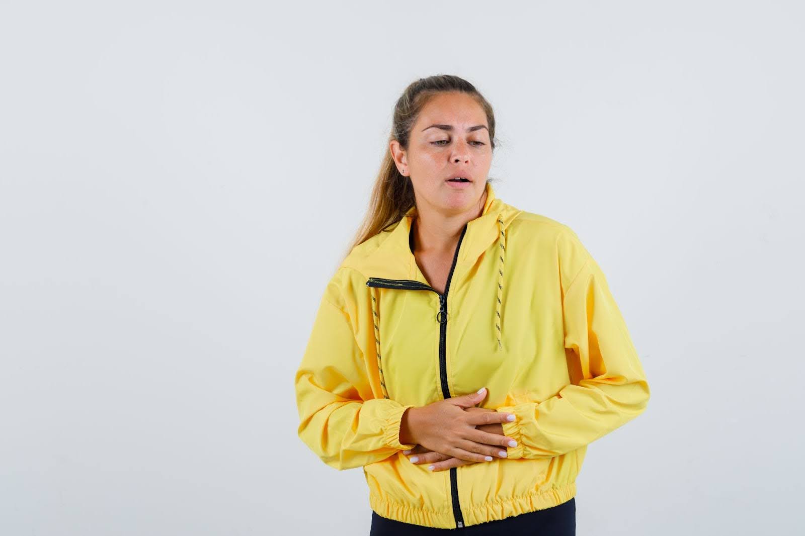 Woman suffering from gastrointestinal pain